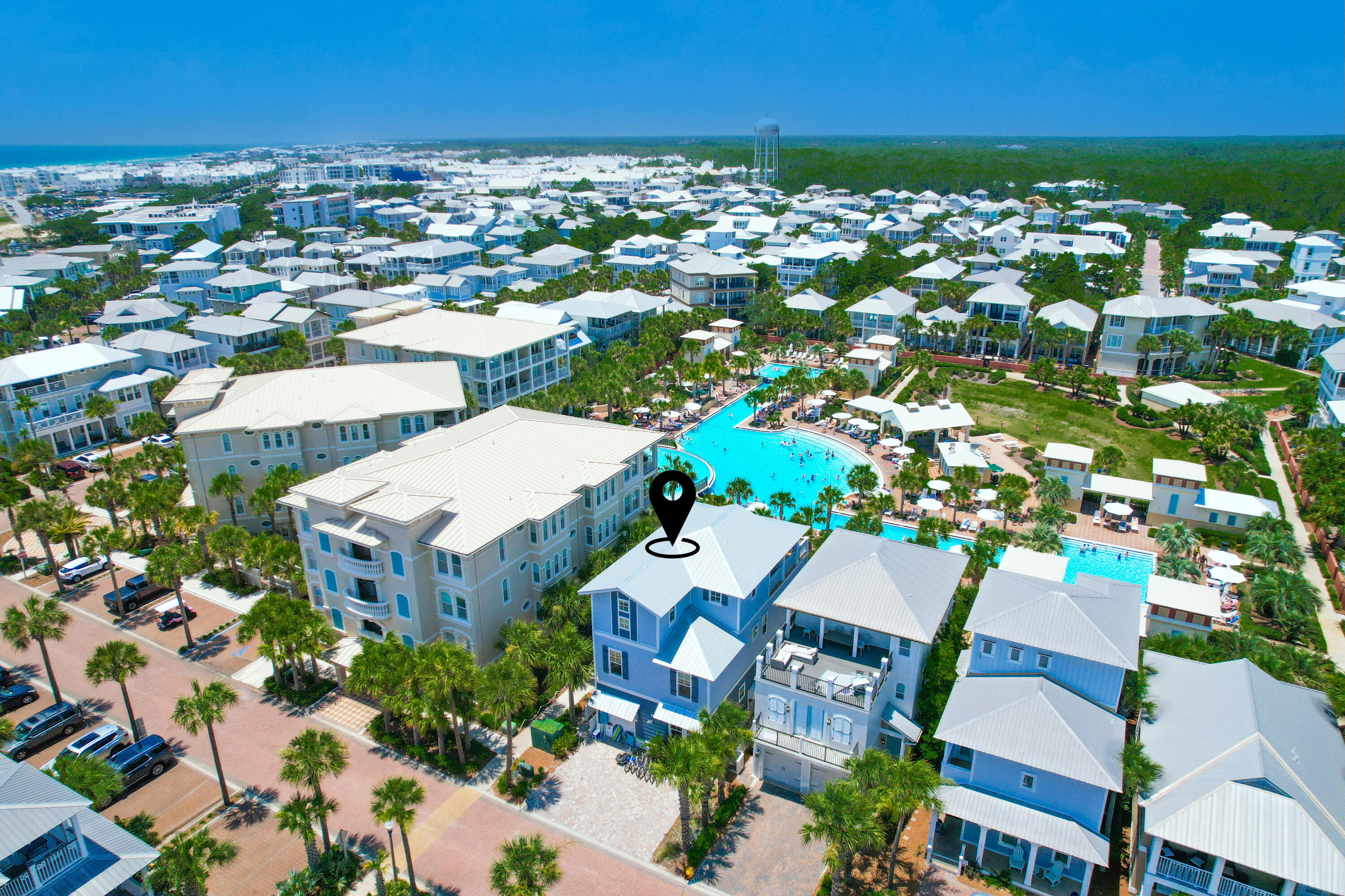 Posh Paradise is the perfect name for this stunning home that sits on the 12,000 square foot lagoon pool in Seacrest Beach. Rarely do you get the opportunity to own in this location. This luxurious property boasts 5 bedrooms, 5.5 bathrooms, and almost 3,000 square feet of living space. Every inch of this home has been meticulously designed and decorated to create an inviting, warm and chic ambiance. The spacious living room is open to the kitchen and dining area, and boasts 12 foot ceilings and is perfect for entertaining guests. The gourmet kitchen is equipped with Viking appliances, top of the line finishes and a large bar with seating for four. The bedrooms are spacious with natural light and ensuite bathrooms. Step out your back door and enjoy grilling on your back deck or walk the few steps to the pool. Want to go to the beach? The tram stop is right outside your door, or walk the short distance to the crystal-clear waters and white sandy beaches of Seacrest Beach. On the 3rd floor of this home is a large bunkroom with 6 bunkbeds that is every child's dream room. You will also find an expansive entertaining area on the 3rd floor that overlooks the pool and has a second grill. Another plus for this home is that it is located at the front of the neighborhood, allowing easy access to 30A. Nestled between Alys Beach and Rosemary Beach, and comes fully furnished! This is the one you have been waiting for! Don't miss out on this amazing opportunity to own a truly special beach property!