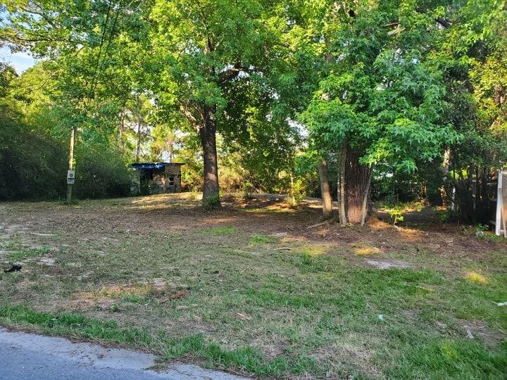Vacant Lot ready for you to build. Mostly Cleared with septic tank & water meter in place. 5 Minutes to the beach! Very close to the Military base, shopping, restaurants, & great schools!