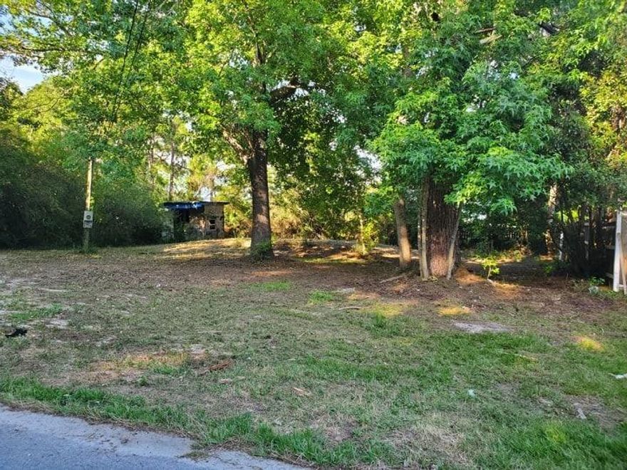 Vacant Lot ready for you to build. Mostly Cleared with septic tank & water meter in place. 5 Minutes to the beach! Very close to the Military base, shopping, restaurants, & great schools!