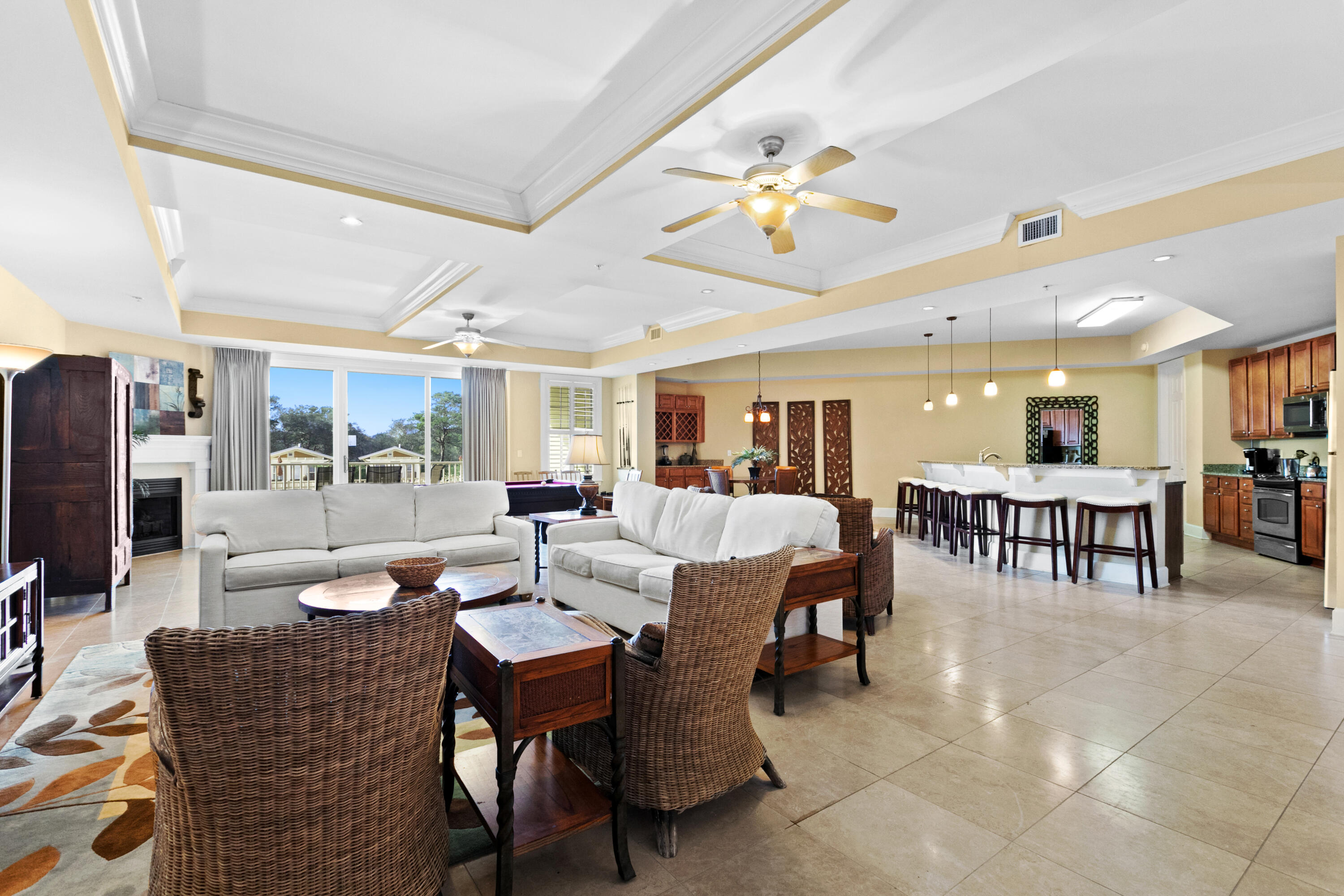 SELLER TAKING BACK-UP OFFERS . BRING ALL OFFERS!!!One of a kind, this condo truly lives more like a home with over 4,000 SqFt sprawled over two levels overlooking Redfish Lake.An entertainer's delight, there are large private covered balconies on both levels. Hang at the wet bar; play pool or cards in the huge living area. A unique feature, this condo has an exterior entrance on both levels, meaning no stairs to go up if you choose. Four bedrooms, one on main level and 4 private bathrooms, large walk-in closets, expansive breakfast bar and kitchen with large walk-in pantry for a crowd. Sanctuary at Redfish has unmatched amenities with four pools, two hot tubs, fire pit, gas grilling area, large fitness center, gated entry, garage parking and a captained boat to the beac