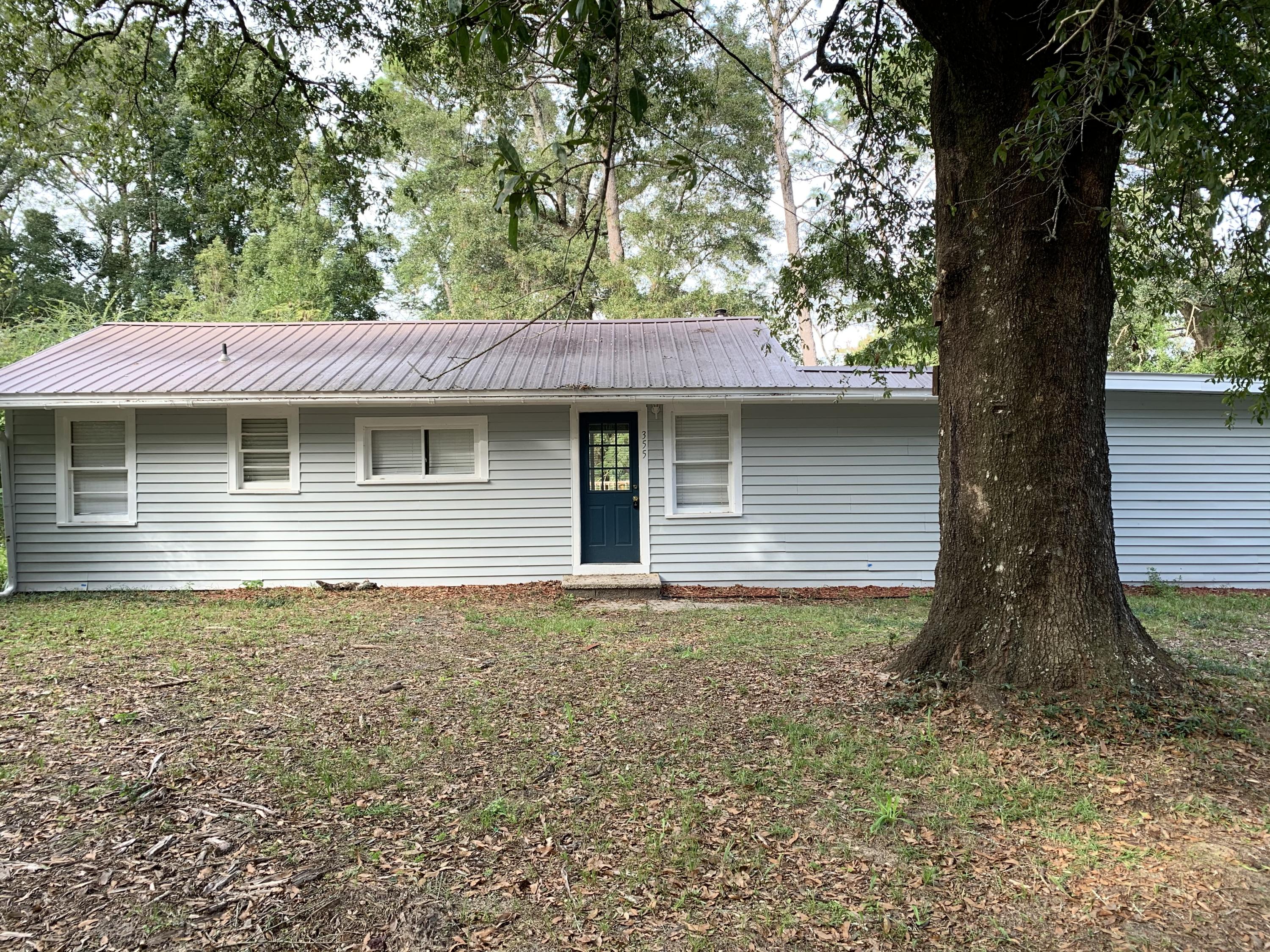 3/2 home located on .33 acres. This home features a cozy kitchen, split floor plan with a spacious master bedroom with ensuite bath. Screened in patio. The wooden back deck gives a great view to a pond and an over size shed for a small boat storage or tinkering with your favorite hobby. Fresh paint, new appliances, new carpet, and more! Would make a great starter home or income property. Vacant and easy to show.