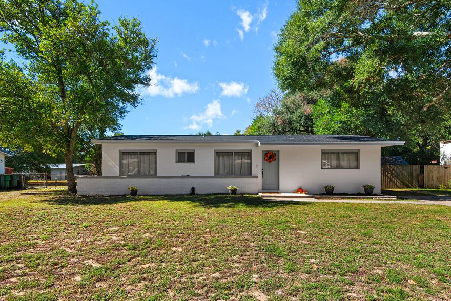 Beautifully modern home offers nearly 2,000&#8239;sq&#8239;ft of open&#8209;plan living. Major systems, including the roof, electrical wiring, plumbing, HVAC with new ducting, and tankless water heater were replaced just two years ago, providing peace of mind. Step into a spacious layout with luxury vinyl plank flooring, granite countertops in the kitchen, and stylish lighting and fixtures throughout. The kitchen flows seamlessly into the living and dining areas, creating an inviting space for everyday family life and entertaining alike. Outside, enjoy an expansive front yard and a fully fenced private backyard, ideal for kids, pets, or peaceful outdoor lunches. Located just minutes from both Hurlburt Field and Eglin Air Force Base, and a short drive Emerald Coast's stunning Beaches.