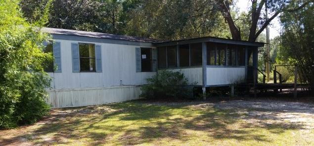 Real Estate Owned REO. This lot is over one and a half acres,chainlink fencing with a very affordable price. The master bath has a garden tub and separate shower. This property is not far from I-10, Yellow River, Guest Lake boat launch and River's Edge campground so convenient location. West of Crestview and East of Pensacola.