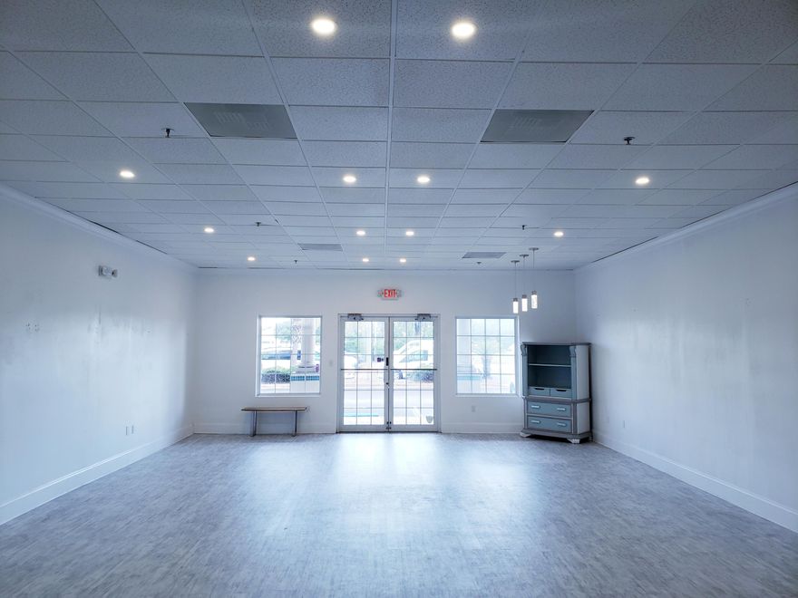 Multi-use open floor plan ready for retail, property management, office space, and more. Located in West Destin at Fountain Plaza and surrounded by many other businesses. Building is on Highway 98 with it's own marquee. Lots of daily traffic and access from both directions.Unit has a custom built shoe rack and two custom built dressing rooms. In the back there is a kitchenette, large shelving, and a bathroom. LVP flooring throughout.