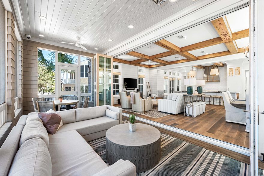 An exquisite coastal sanctuary, this 6BR/6.5BA WaterSound Beach masterpiece offers a harmonious blend of timeless elegance and modern luxury, all with stunning views of the Gulf of Mexico. Nestled between the serene Yacht Pond and scenic Linear Park, this professionally designed home captures the essence of refined beachside living throughout the over 4,200 square feet of living space. Wide plank reclaimed hardwood floors, elevated wooden beam ceilings, and an abundance of natural light enhance the open-concept design, while a nano wall seamlessly connects indoor and outdoor spaces. The inviting family room extends to a spacious screened porch, complete with a dining area and a cozy fireplace--perfect for embracing the tranquil coastal ambiance. A private jacuzzi on a screened porch provides the ultimate relaxation after sun-soaked days.

The centerpiece of the living area is a gourmet kitchen, adorned with Thermador appliances, custom cabinetry, marble countertops, and Chicago brick inlays, all expertly designed around an expansive island ideal for entertaining. Two primary suites showcase high ceilings, shiplap accents, and spa-inspired ensuites, with one offering private access to a sprawling porch. Three additional guest suites echo the home's coastal charm with bespoke finishes such as wood-paneled ceilings and exposed beams. Upstairs, a custom metal staircase leads to a playful bunk room and study, while the pinnacle featurea majestic towerboasts panoramic gulf views.

An outdoor shower, a two-car garage for beach essentials, and a private gated entry complete this extraordinary residence. WaterSound Beach offers an unparalleled coastal lifestyle, featuring a mile of private pristine shoreline, exclusive community amenities, and close proximity to world-class dining and shopping. This premier offering presents an exceptional sanctuary where luxury meets the laid-back beauty of 30A's renowned coast.
