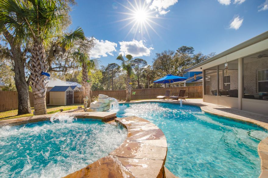 Whoa!! What a find with right at $64,000 worth of upgrades added to this like new property (3 years old) located 220 yards from Deep Water Boating Access! Click on the Photos & discover the ultimate in Florida living with the incredible Tropical Breeze pool, the great open layout, the beautifully manicured palm tree accented backyard, and an outstanding location that gives you 5 minute access to the beach, 2 minutes to shopping, 3 minutes to a multitude of fine restaurants, and easy access to several entertainment venues less than 5 minutes away. Extremely well built with energy efficiency in mind. The Cost to Own this home is very affordable. Step up to the Quality of Life you've always wanted in the Sunshine State! Buy it nowlove it forever!