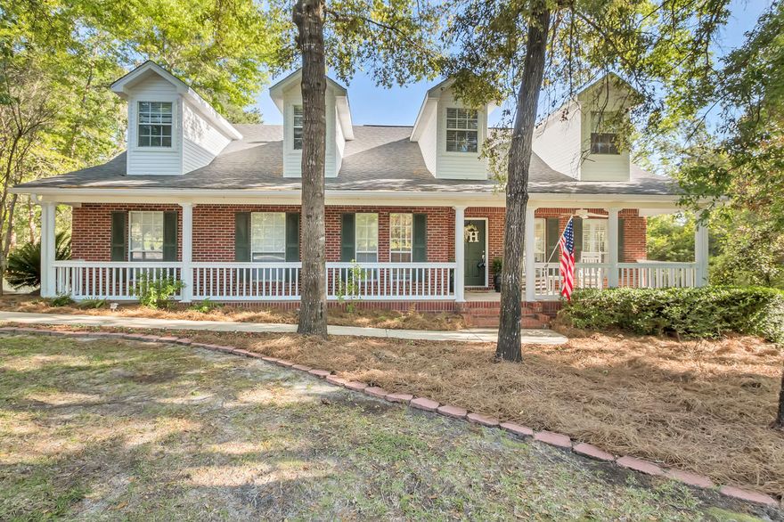 Charming dormers adorn this Southern traditional beauty with 288 square feet of front porch space. Sit back and relax and enjoy the sanctuary that surrounds you on almost .3 acre lot. As you enter the front door you are greeted with a view of the living, dining and chefs kitchen with wall to wall windows overlooking the fenced-in backyard. The vaulted ceiling in the living room and abundance of windows allows for ample sunlight throughout the day. The lot backs up to a green space so there are no neighbors behind the home which provides extra serenity and privacy. The large master bedroom is on the main floor and has a gorgeous master bathroom en suite with soaking tub, separate shower and walk-in closet. Off the master bedroom is a over sized screened-in porch, perfect for relaxing Off the screened-in porch is the perfect deck over looking the backyard. If you love to grill out you will truly enjoy this space! Luscious green grass, planter boxes and privacy fence is yours to use as you wish, there is plenty of space for a pool, trampoline, workshop and swing set.

Upstairs there are 3 additional spacious bedrooms all connecting to a loft area. The common space is perfect for a game room, TV or even a home school classroom area. All the bedrooms enjoy nice sized closet space, and two rooms have access to the attic storage space for all your holiday items. The main bathroom upstairs has dual sinks and a tub/shower surround.

This is one of Niceville's most sought-after neighborhoods that enjoy the Niceville school district and low annual HOA fee. 