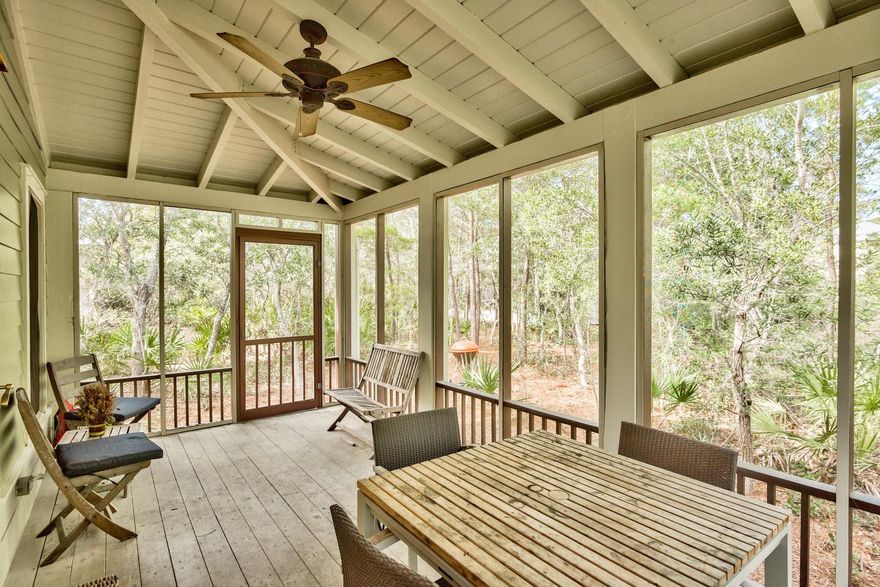 Magnolia Cottages, is southern coastal cottage charm tucked beneath cascading oaks trees for private living that is just a five minute walk from the beach. This 3 bedroom 3 bath home is perfect for a second home or a vacation rental. The neighborhood features a community pool, brick paver streets, a deeded beach access, and golf cart parking along the beach. Located within a very short distance of Alys, Rosemary, and Seacrest Beach, there is easy accessibility to shops and delicious dining. This quaint cottage features beautiful hardwood flooring, an open floor plan with eat-in kitchen, granite counter tops, and a breakfast bar just off the main living area that is perfect for gathering the whole family. The first floor also has 2 bedrooms and 2 full bathrooms, one of which is accessible from the hallway for guests. On the second floor is a spacious master suite complete with walk- in closet, double vanity and a private walk-out deck.  There is a large screened in porch on the bottom level that calls you to times of relaxation all throughout the day surrounded by a wooded lot for optimal privacy.