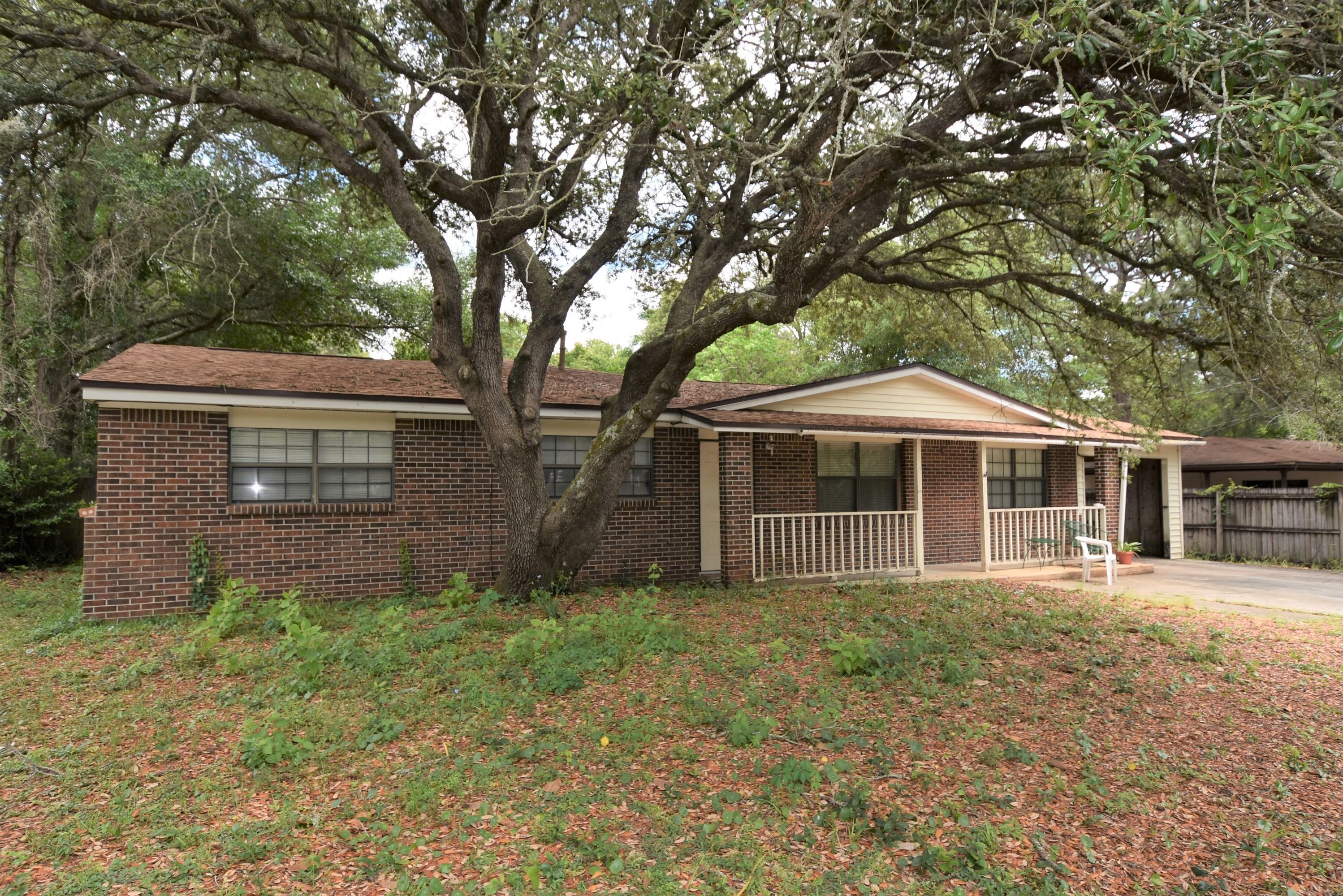 Affordably priced! Spacious Living Room plus a Family or Florida Room. Large back yard is partially chain link fenced and there is a storage building and patio. Master Bedroom has a huge walk-in closet, 13x6'4 and the Bathroom has shelving and a double vanity. The 4th Bedroom has a separate entrance from the Carport. Make arrangements to see this home today!