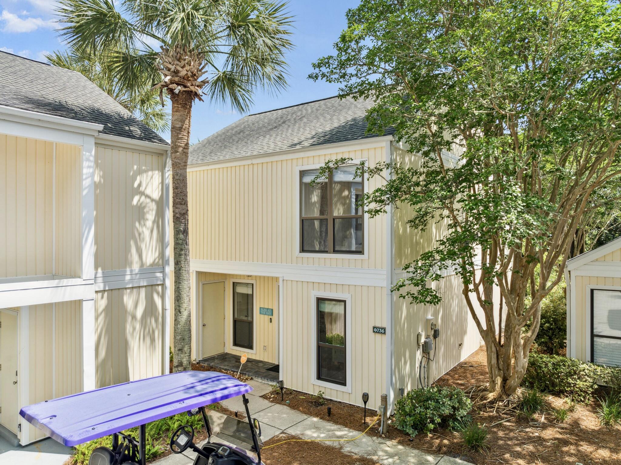 Offering a laid-back beach, golf and resort lifestyle at Sandestin, this well-planned property in Sandpiper Village has the space and privacy of a detached home with the maintenance benefits of a condo. $100k in gross rental for 2025. It's ideal as a vacation rental or permanent residence right on Links Golf Course. With access to nearby pools, private boardwalks, the beach, pickle ball and tennis courts, and the Village of Baytowne Wharf., this is refined living at its best. Designed with floor-to-ceiling windows to maximize natural light, the home benefits from tile floors and an L-shaped living room with pleasant green views from every window. The well-appointed kitchen has beautiful quartz countertops. Offered fully furnished with 2 golf carts. Your association dues include landscaping, exterior maintenance, community pools, daily trash collection, basic cable, deeded beach access, security gates, and more! Special assessments which cover wind insurance, property insurance and flood insurance are $690/mo.