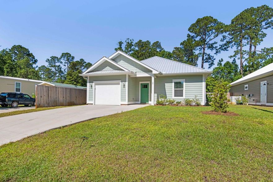 Welcome to 25 Central 8th St, a charming single-family home offering the perfect blend of comfort and modern living in the heart of Santa Rosa Beach. With 1,524 square feet of thoughtfully designed living space, this home features 3 spacious bedrooms, 2 beautifully appointed bathrooms.Step inside and be greeted by an open and airy layout with stylish ceramic and laminate flooring throughout. The well-equipped kitchen is a chef's dream, complete with a breakfast bar, pantry, dishwasher, and a designated kitchen dining area. Recessed lighting and elegant chandeliers add a touch of sophistication to the living spaces, creating the perfect atmosphere for both relaxation and entertaining.The in-home laundry space, complete with a washer and dryer, adds a layer of everyday convenience. Step outside to enjoy the private fenced backyard, complete with a patio perfect for gathering with friends or savoring quiet afternoons. The home also features a spacious garage for parking and additional storage. Fully Furnished ready for vacation rental. Turnkey ready. Conveniently located 3 miles from beach access, a half-mile from Cessna Landing park and boat launch, and close to Hwy 98 and 331!