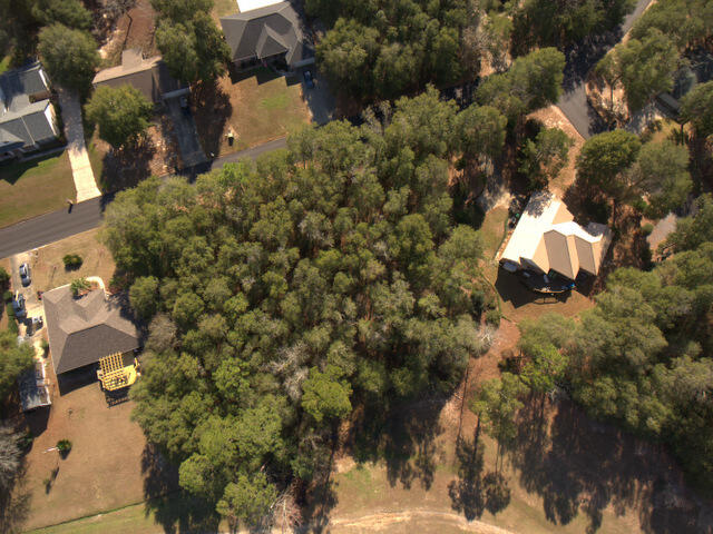 One of the few and best lots available. This is a nearly a 1/2 acre lot, has a wonderful view and is ready to go. The land was septic perked at the back of the property to allow for a walk out basement and lower level bathroom. The septic perk tests were approved. There is a slow grade to the land that would work great for a walk out basement or will work great for a one level home with no basement. The owner also has a valid survey available. Come and enjoy this property that is located in the county for much lower property taxes. If you're ready to build your dream home or looking for an investment, there are great things coming to the Foxwood country club area!!