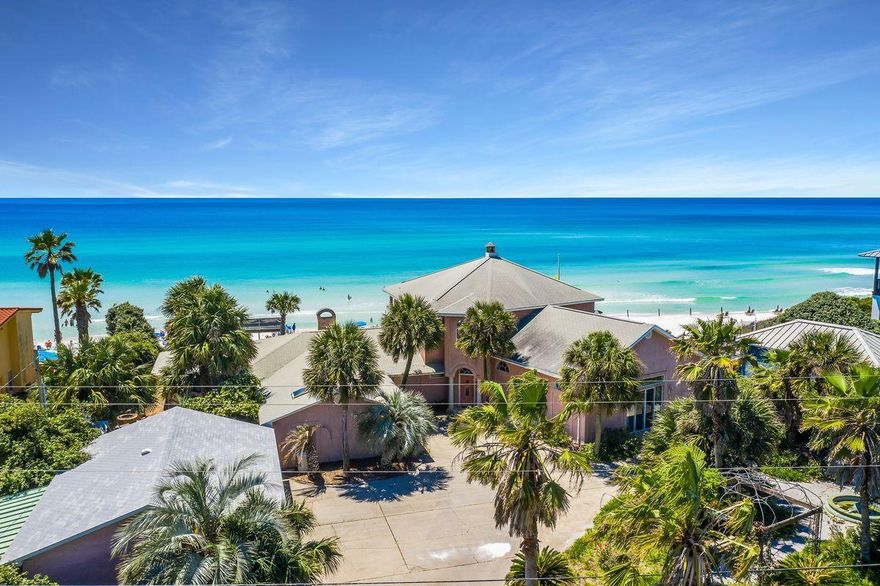 Prime building site situated on a double lot directly on the beach perched at an impressive elevation presiding over unparalleled gulf vistas located on the coveted Blue Mountain Beach Road along Scenic Highway 30A. This highly sought after location is one of the most opportunistic on 30A. This premium site has a seawall currently intact and a 4700 square foot beach house complete with 5 bedrooms, two living rooms, a great sitting room and a garage that could provide temporary use while designing a permanent residence. Blue Mountain Beach Road is adjacent to Big Redfish Lake and within excellent proximity to central 30A including Seaside, Watercolor and Grayton Beach.