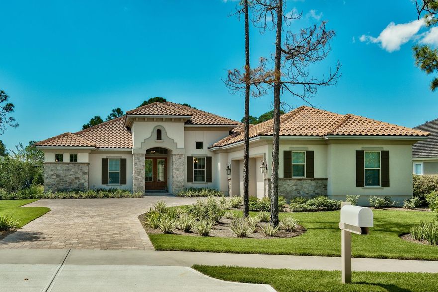 Immaculate one story, four bedroom, three bath custom home overlooking the #11 tee box in the desirable gated golf community of Kelly Plantation. Very lightly lived in and absolutely gorgeous. Meticulously designed, this beauty lives much larger than most homes with the same square footage, with a fabulous open concept floor plan that flows seamlessly for gracious entertaining and casual coastal living! The living areas overlook and open onto a tropical oasis, with sparkling custom pool, covered patio and summer kitchen....this will certainly be a favorite gathering spot for family and friends! Beautifully appointed kitchen will please the fussiest cook and features a large center island with gleaming single slab granite countertop, large breakfast bar, abundant custom cabinetry,