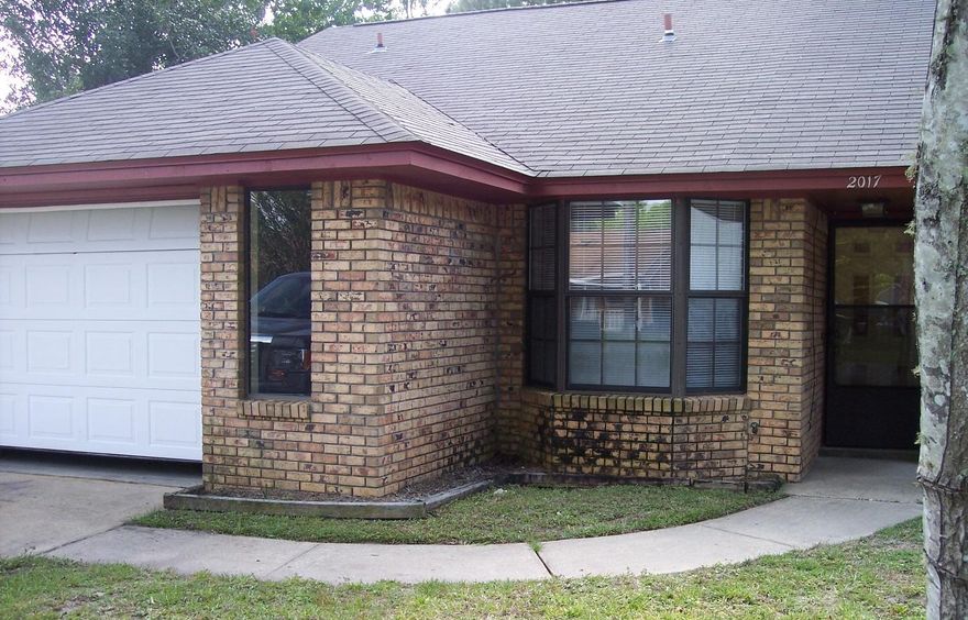A great starter home tucked away on nice little cul-de-sac near the Eglin Reservation. Plenty of kitchen cabinet and counter space with stainless side by side fridge with ice/water in door; breakfast bar; tinted french doors from dining room to side patio; wood burning fireplace in LR with cathedral ceilings; 3rd bedroom up at front of house and can be used as office; HUGE privacy fenced back yard; master bedroom has sliding glass doors that open to back patio. Any size pet with non-ref pet fee. Available October 10, 2019