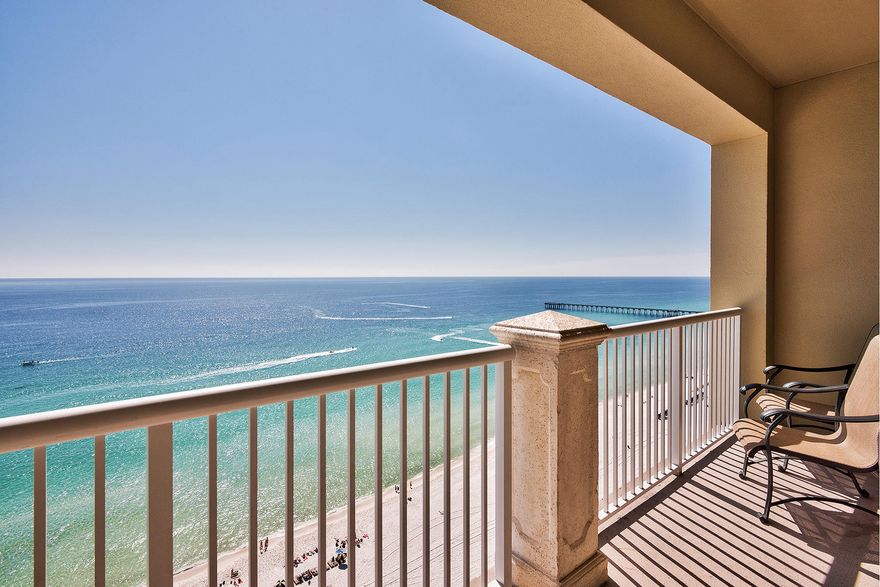 This lovingly maintained and move-in ready gulf front unit on the 20th floor does not disappoint. Its stunning coastline views that capture a pier, located less than half a mile to the west, can be enjoyed from its spacious covered balcony which can be accessed by both its open living areas with tile floors, as well as its master bedroom. Hallway bunks increase its sleeping capacity. The stylish master bath features a tub and separate shower. Stainless steel appliances and granite counters appoint the modern kitchen with bar seating. The guest bath boasts similar updates that include a granite-topped vanity and subway tile bath surround. Grand Panama Beach Resort offers on-site amenities that include two pools, a hot tub, tiki bar, fitness center and conference room.