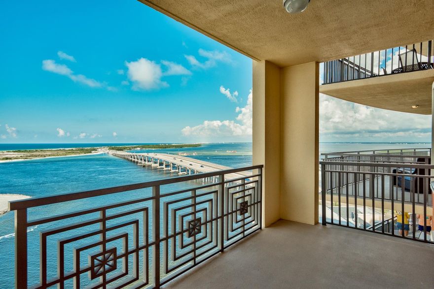 With water views that will take your breath away and high quality craftsmanship throughout, this waterfront condo raises sophistication to a new level. Itoverlooks panoramic views of Destin Harbor, Choctawhatchee Bay, Gulf of Mexico, Crab Island and Okaloosa Island. Covered balconies off the open living space and two master suites offer front row seats to stunning fireworks and glorious sunsets. Natural daylight streams in large windows and multiple sliding glass doors for a bright, inviting, neutral tone interior. A charming, curved counter with bar stools and curved ceiling directly above looks into a kitchen outfitted perfectly with stainless steel appliances, granite countertops and contemporary backsplash.