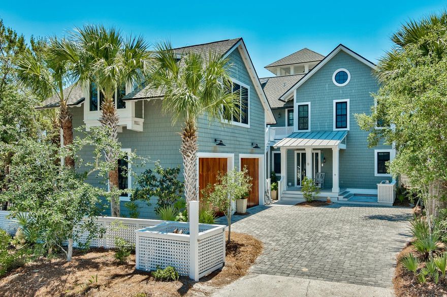 With its five bedrooms, welcoming floor plan surrounded by peaceful porches, fun bunk room, inviting carriage house, Sonos home audio, and Gulf view watchtower, this quintessentially WaterSound Beach house makes the ideal family retreat for those looking for a second home and one sure to attract vacation renters! Recently rejuvenated and beautifully designed by Taylor and Kelly Interiors with a light beach palette, this coastal chic home has the combined kitchen/living area that everyone is looking for that is spacious yet cozy and connected where families can gather, eat, drink and enjoy cooking together at the kitchen's large island and 6-burner Dacor gas range. You won't find another turn-key, corner lot property in WaterSound this close to the beach with this much appeal at this price!