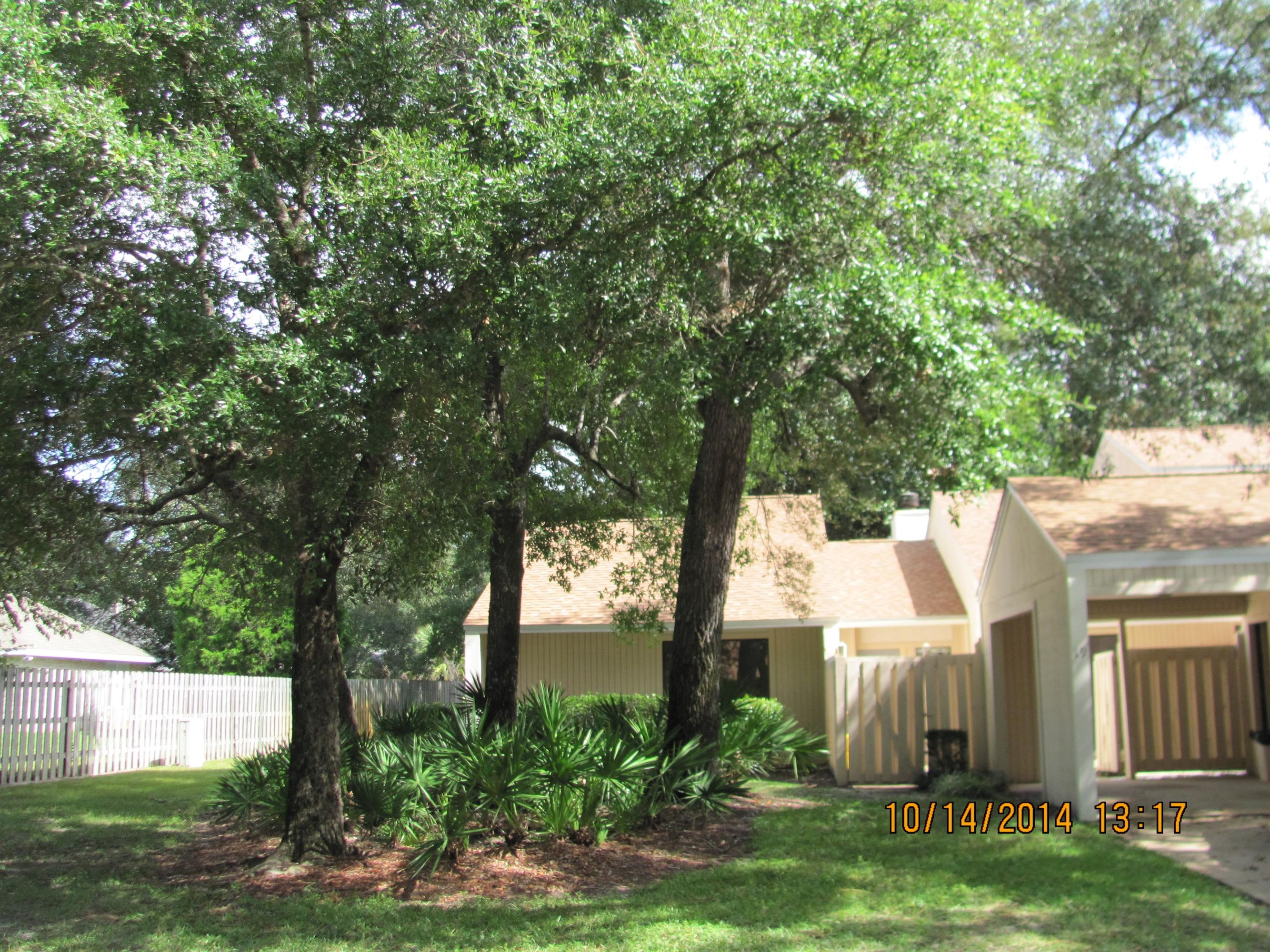 Tranquil setting for this lovely townhome which is located at the end of a street in Royal Oak Village. Beautiful, peaceful surroundings just adds to the beauty of the home. Once you open the front gate you are greeted by a beautiful patio area which is ideal for shrubs and flowers. Their is a sliding glass door leading from the breakfast room to the outside patio for quite breakfast and relaxing dinners. Kitchen has (16'' X 16'') tile countertops and there's also a tile backsplash. There is a 7'-7'' tiled breakfast bar and under cabinet lighting. Ample cabinets, pantry with wire shelving, double stainless sink, electric smooth surface stove/oven, built in Kenmore microwave, and Kenmore refrigerator. One entire wall in the Formal Dining Room has an elegant mirror which add depth and beauty