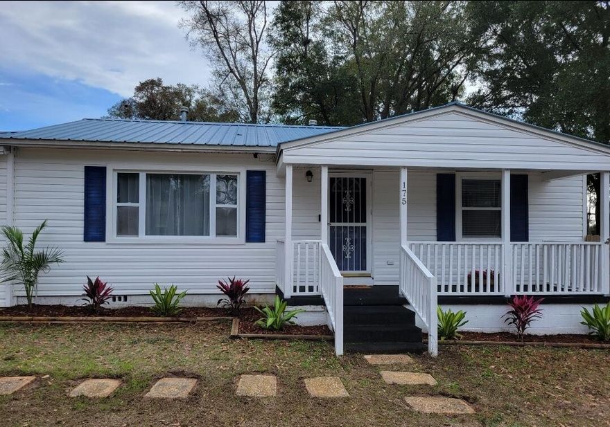 Looking for a great starter home with a huge man cave or she shed with an additional yard building? Look no further. This cute three-bedroom home features a beautiful updated kitchen, metal roof, HVAC installed in 2023. Enjoy the screened-in porch, and open deck, along with a large, fenced backyard. Plus, you get the flexibility of both gas and electric options. The driveway easily fits multiple cars or recreational vehicles. As a bonus, the home comes with two TVs, washer and dryer, couch and two refrigerators, helping to ease the costs of settling into your first home. All appliances convey as is.