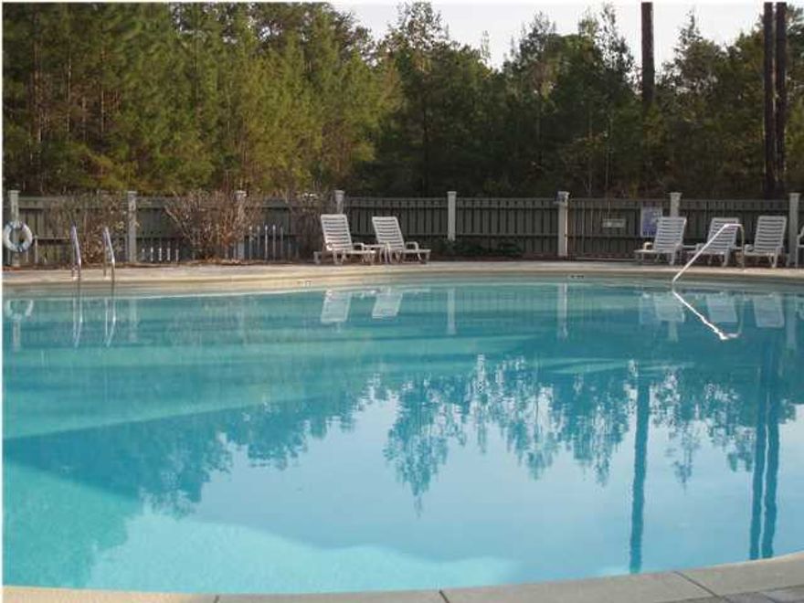 REDUCED! ALL offers considered! Nestled among centuries old magnolia's, Live Oaks, Hickory and Pines, beautiful Grayton Bayou home site in tranquil community featuring paver stamped streets, concrete curbs, classic street lamps, underground utilities and community pool. Bordered by Pt. Washington State Forest and Choctawhatchee Bay, minutes from Grayton Beach and all 30-A has to offer. This lot is high and dry, in desirable Zone X. NO flood insurance required! There's no build out time and the community covenants and restrictions preserve your investment for years to come. A well designed home plan may afford you views of the Bay. Being within walking distance to the Bay front park, Community pool, and Boat Launch, you're ensured to have the very best Florida has to offer!