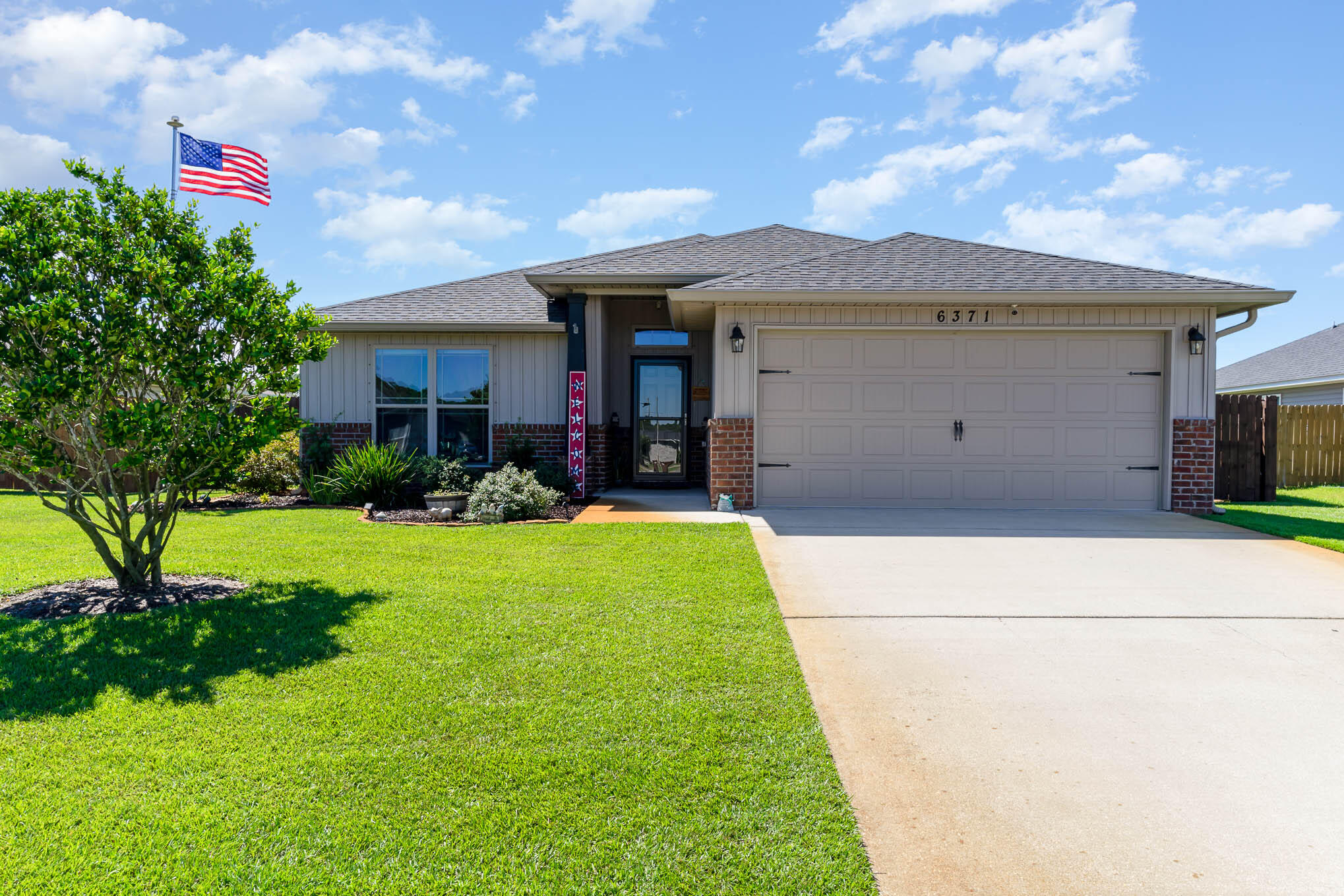 This incredible home is only 4 years young and packed with amazing features and upgrades. The beautiful kitchen with granite counters and breakfast bar, stainless appliances, and ample cabinetry, is enhanced by Alexa controlled lighting, and wood shelving in the pantry. Relax on the expanded and screened patio with lighted ceiling fans or step inside and pull the retractable screen closed on the French doors. The garage is the envy of the neighborhood, with plenty of wall-mounted cabinetry, TV on swivel wall-mount, 12K BTU mini-split HVAC, and insulated roll-up door that is Alexa controllable.Wood-look LVP throughout the home. Master bath features a tiled shower, soaking tub, and walk-in closet.There's so much more to see. Schedule your showing today!