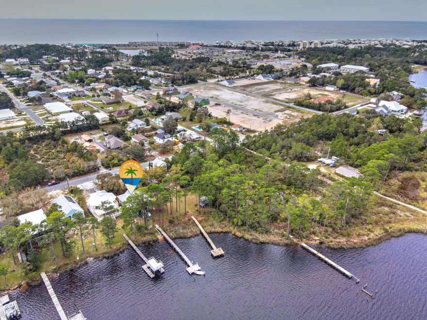 Rare opportunity to own a lakefront home in the highly sought after Lake Powell community located on the far West end of Panama City Beach. Recently referred to as ''East Rosemary'', this community is growing quickly in popularity and value in addition to what the current residents already love about it. Within minutes of 30A and all it has to offer, Publix and Winn Dixie, Camp Helen State Park and the white sandy beaches and emerald waters of the Gulf of Mexico. With 50' of lakefront and a 100' dock you will be on the water in no time. The public boat ramp is right around the corner for easy access and many days of fun in the sun and great fishing! The home boasts large plate glass windows overlooking the gorgeous lake from the dining room, living room and master bedroom.