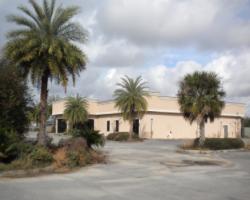 12033 SF building sitting on 2 Acres on North W Street near West Florida Medical