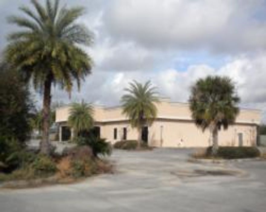 12033 SF building sitting on 2 Acres on North W Street near West Florida Medical