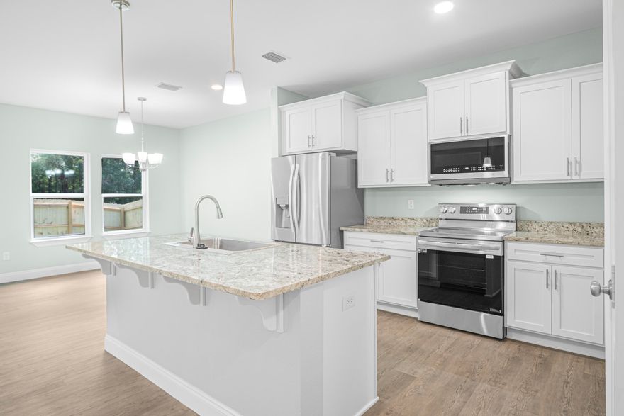 BRAND NEW HOME! Construction is complete, and it is ready for a homeowner! You will love this floorplan with a large foyer that flows into a beautiful open living space with lots of natural light, vinyl plank flooring, and large kitchen with an island, granite countertops, white cabinets and more! The upstairs features 4 bedrooms including the exceptionally large master suite with a beautiful bathroom and enormous walk-in closet. The guest bedrooms are great as well with the 4th room being very large and could be utilized as a play/game room. The separate laundry room is also upstairs! So no toting laundry all over the house! The backyard is decent with a beautiful shade tree. This is a great family, starter or military home with lots of storage and an easy and incredible layout!