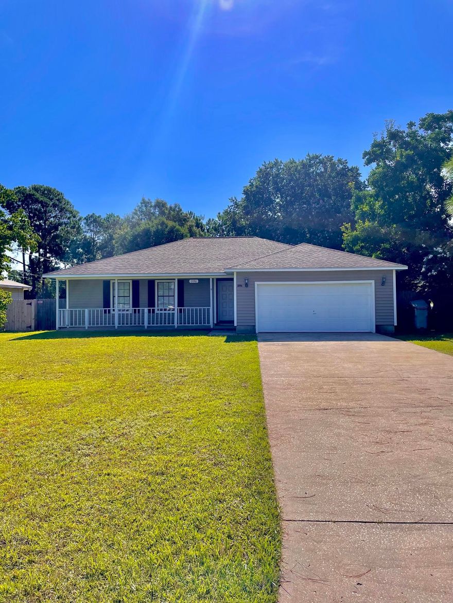 Beautiful 3BR/2BA home in a great location! Close to beach, shopping and Hwy 98 & Hwy 87. Open Living Room with laminate wood flooring and corner STONE FIREPLACE with raised hearth and Mantel. Large KITCHEN with plenty of cabinets, counter space, pantry, NEW RECESSED lighting and upgraded appliances. Spacious MASTER SUITE, Walk in Closet and RENOVATED BATHROOM! 2-CAR GARAGE with Workbench a HUGE PRIVACY FENCED backyard with CRABAPPLE Tree and Oak Trees. FIRE PIT and concrete PATIO for outside enjoyment. New HVAC system!