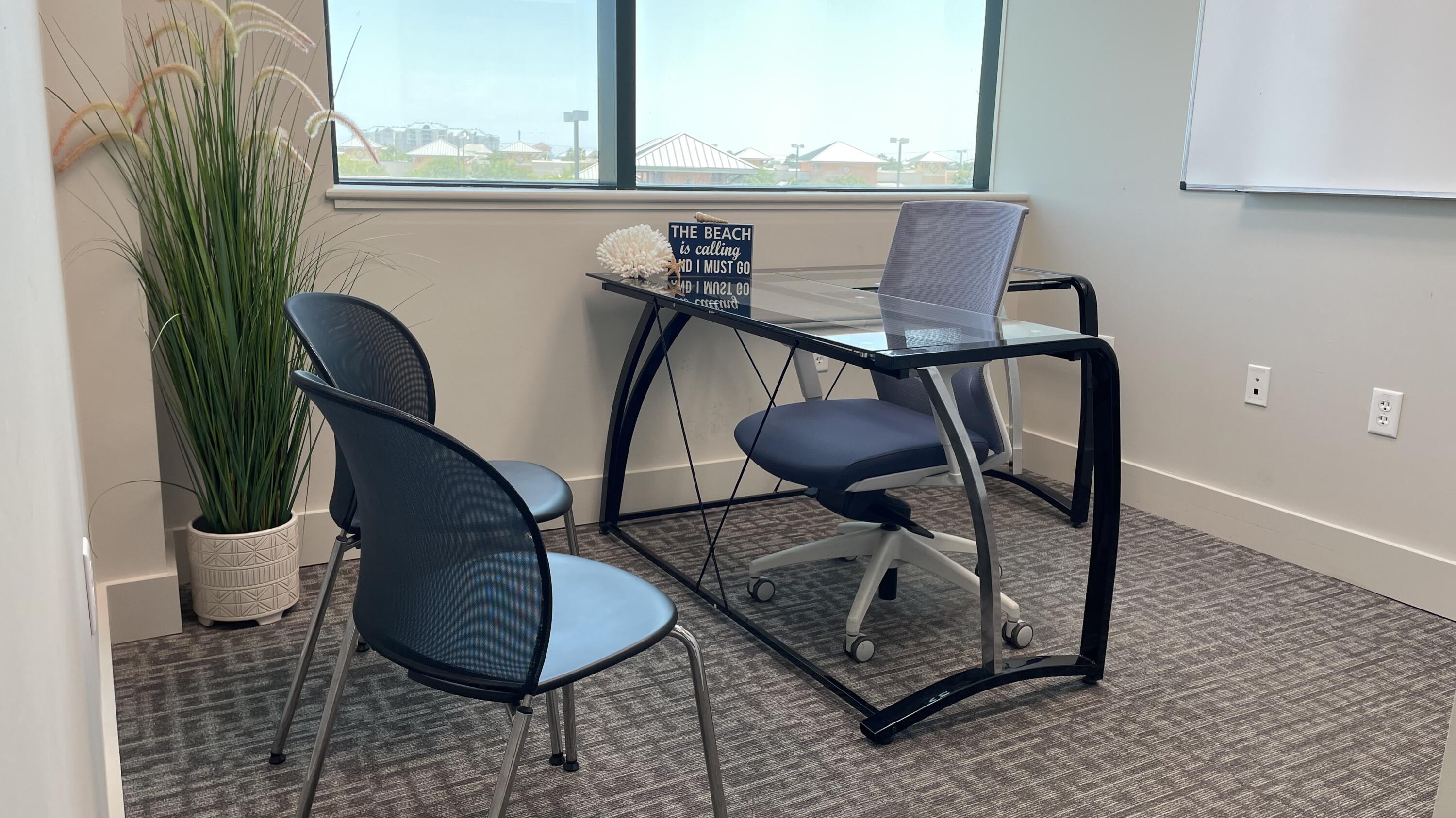 100 sq ft, sliding glass door, ( no lock ), furnished with glass L-shaped desk an individual :office and guest chairs, wall art and a white board; lots of natural light facing the south. Includes amenities, unlimited parking, 24/7 access to BeachWorx. $1100 a month with a discount for a 12 month commitment.