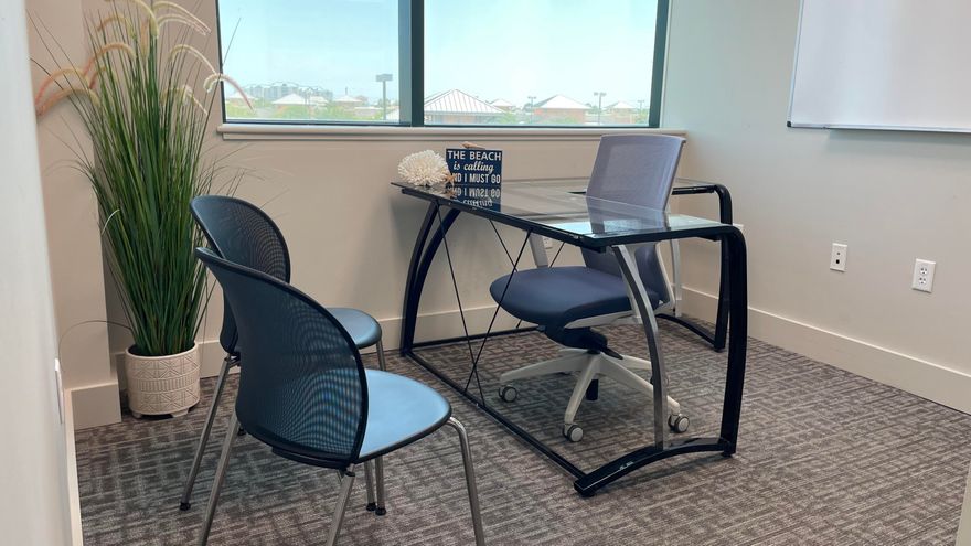 100 sq ft, sliding glass door, ( no lock ), furnished with glass L-shaped desk an individual :office and guest chairs, wall art and a white board; lots of natural light facing the south. Includes amenities, unlimited parking, 24/7 access to BeachWorx. $1100 a month with a discount for a 12 month commitment.