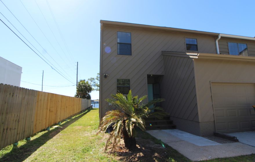 BRING YOUR BOAT! FANTASTIC END UNIT WATERFRONT TOWNHOME SITUATED ON A QUIET CUL-DE-SAC IN THE HEART OF FORT WALTON BEACH! Spacious living room freshly painted with plank tile flooring throughout and double sliding glass doors that span the waterfront and lead out to the deck area. Dining area is open into the living area making entertaining a breeze. Kitchen has custom cabinets to include soft close drawers, built-ins and spice racks, lots of smooth top counter space with a under mount sink, upgraded stainless appliance and a breakfast bar. Large laundry room with plenty of storage. Waterfront master bedroom with new French doors that lead out to the balcony overlooking the water. Master bath has double closets, extended vanity and separate room with walk-in shower and toilet.
