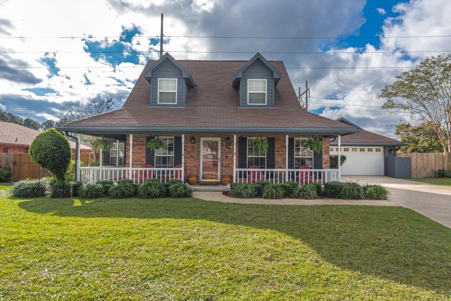This Fort Walton Beach GEM with wraparound front porch is ready to welcome you home!  As you enter the front door, this home features a large living room and formal dining room.   Moving towards the back of the home, an open kitchen with breakfast nook and the master bedroom on the main floor will surely delight you!  There is also a half bathroom for guests.  On the second floor, you will find two additional bedrooms with dormers that are perfect for desks or reading nooks plus a full bathroom.  We cannot forget about the backyard!  The backyard boasts of an extended patio, fire pit with benches, plus an oversized workshop with front porch and electricity!  Plenty of parking is also to be found between the detached 2 car garage and a driveway long enough to hold eight cars!