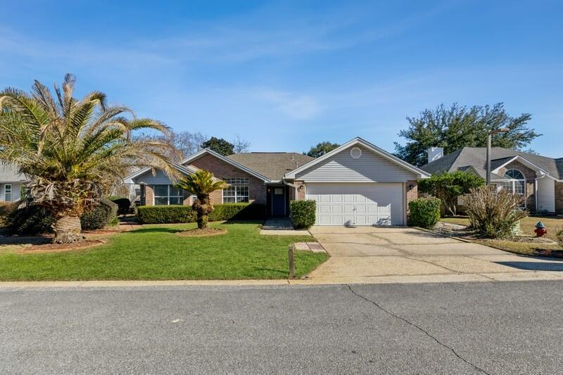 Well maintained 3 bedroom 2 bath brick ranch in the sought after Parkwood Place subdivision with great curb appeal. This home has a very functional split floor plan including a formal dining room, living room with a fireplace, Florida room and eat in kitchen. The enitre house has been painted with the popular sea salt color. The privacy fenced backyard has a large deck for entertaining and professional landscaping. There is a whole house natural gas generator in the event there is a power outage. Conveniently located near Bluewater Elementary, multiple shops and restaurants. Just a short drive to the white sand beaches of the Gulf of Mexico. Don't miss the chance to make this house your home, call for an appointment.
