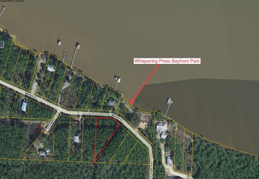 This large wooded 1/2 acre lot is located direct across the street from the Bay and the Whispering Pines Bayfront park area. There is no HOA and your future home could have stunning Bay views. This is a rare opportunity to own a gorgeous piece of land in Santa Rosa Beach with ''forever'' Bay views for under $100,000.