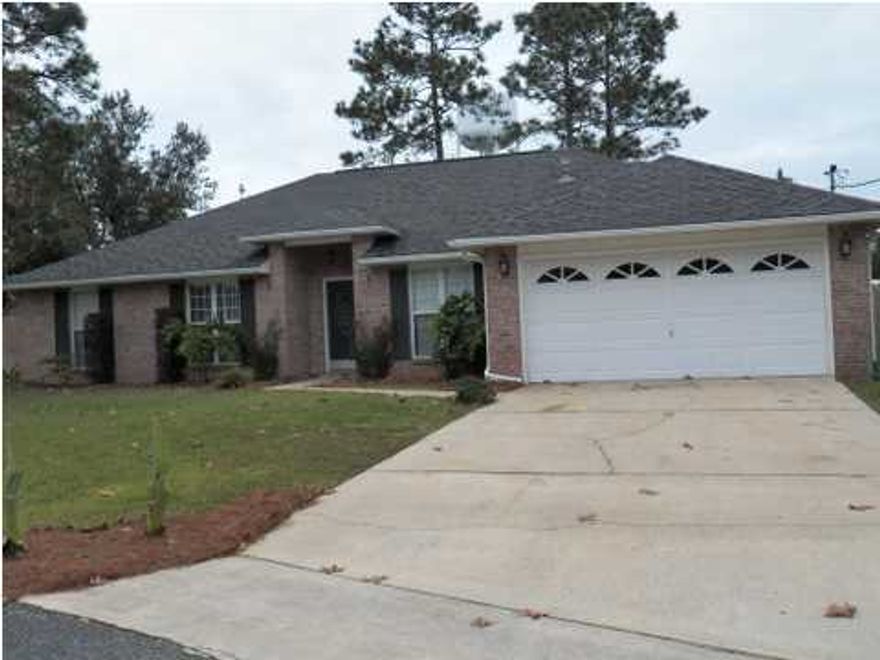 This great home is located in a wonderful culdesac location south of I-10 and is being offered at a fantastic price as a short sale. The owners have done many upgrades throughout this 4 bedroom, all brick home. Once you enter the tiled foyer you will find a formal dining room on the right side and a 4th bedroom or media/office room to your left with French doors. The bedrooms are laid out into a ''split bedroom'' floor plan. In the center of the home is a large, open great room with vaulted ceilings, upgraded lighting, laminate wood flooring, and a corner fireplace. The kitchen has been completely upgraded and remodeled recently, as well. There is a glass, tiled backsplash, center work island and tiled floors. The master bathroom has a large vanity area, a walk-in closet, tiled