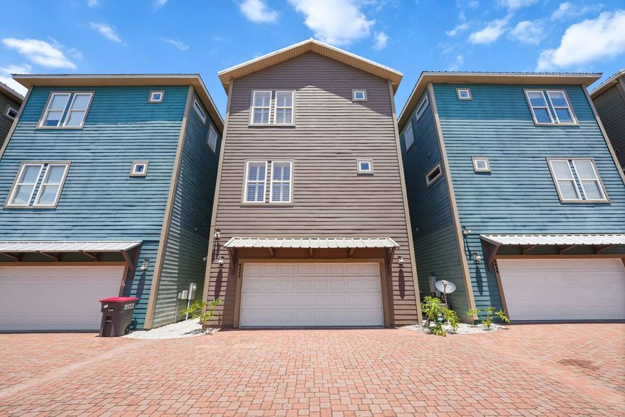 This NEWLY RENOVATED Panama City Beach House is a gorgeous vacation home in one of Panama City's premier ocean communities, Panama Dunes!! Newly renovated and fully furnished this home is just a short walk away from the white sandy beaches of PCB! This fully furnished (rental ready!) three story home offers a peak of the gulf from the balconies! Balconies overlook a quaint little courtyard with in-ground pool, grill / picnic area, and hot tub. This rental machine offers 4 bedrooms & 4 baths and also has a 2 car garage. Just 2 blocks from the Gulf and close to amenities! Lets not forget about the interior features - recently renovated and furnished this home offers hardwood flooring, granite countertops, stainless steel appliances, and tiled showers! Rental Projections now over 85K