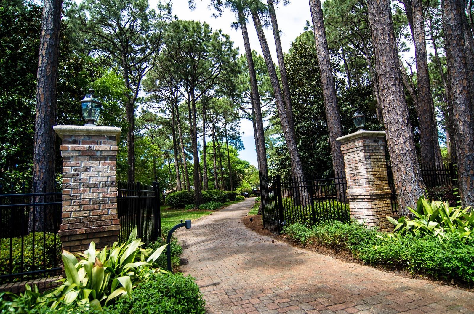 WOW! $100,000 price reduction! Seller says bring an offer! You won't find many homes as immaculate and well-kept as this Bay-front estate! One of the largest lots on the bay with nearly 1.2 acres of lush landscaping, entertaining and living space. 100 feet on Choctawhatchee Bay and nearly 5,000 square feet of living space this home needs nothing! It was completely renovated and updated in 2002 and is warm and inviting. Solid oak floors throughout the living areas & master bedroom; 3 gas fireplaces plus 1 wood burning fireplace; wet bar with wine refrigerator & ice maker; 3-inch plantation shutters; 3 A/C units, water filtration system, hurricane impact glass; and security system w/ADT connected fire alarm. The living room and family room both have brick fireplaces and built-ins.