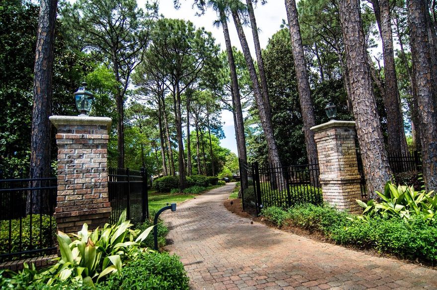 WOW! $100,000 price reduction! Seller says bring an offer! You won't find many homes as immaculate and well-kept as this Bay-front estate! One of the largest lots on the bay with nearly 1.2 acres of lush landscaping, entertaining and living space. 100 feet on Choctawhatchee Bay and nearly 5,000 square feet of living space this home needs nothing! It was completely renovated and updated in 2002 and is warm and inviting. Solid oak floors throughout the living areas & master bedroom; 3 gas fireplaces plus 1 wood burning fireplace; wet bar with wine refrigerator & ice maker; 3-inch plantation shutters; 3 A/C units, water filtration system, hurricane impact glass; and security system w/ADT connected fire alarm. The living room and family room both have brick fireplaces and built-ins.