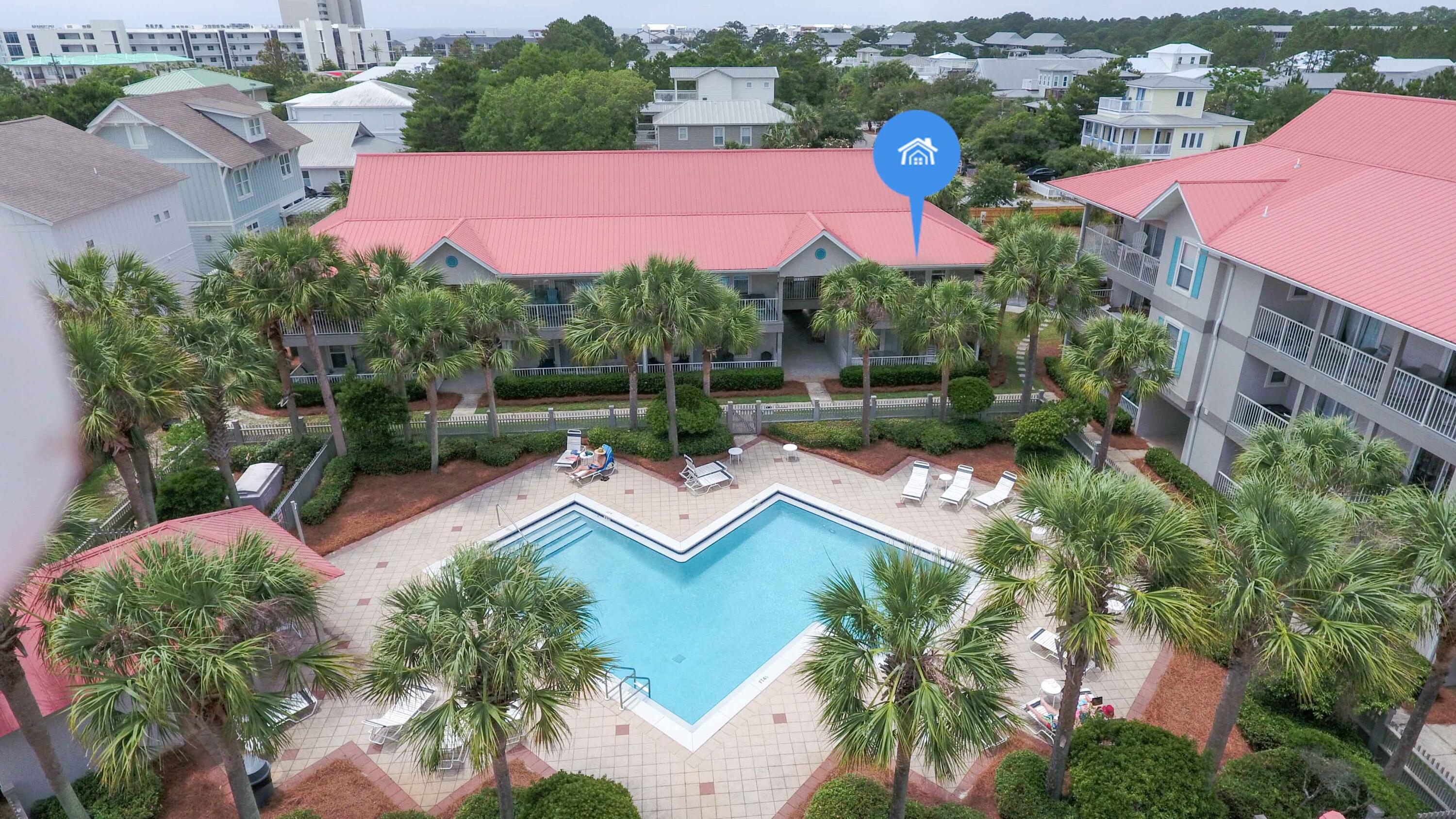 Rollin Tide Villas is a small family friendly complex with all units surrounding a large heated pool. This end-unit condo is one bedroom with a king size bed, queen sleeper-sofa and full bath with a washer and dryer. The kitchen is fully equipped for your cooking needs. The living room, dining area and second story balcony look out over the palm tree lined pool area. There is a convenience store and several restaurants in the area, from donuts and fine dining to casual Mexican and Italian pizza. Two public beach entrances are nearby, including one with a drop off/loading area. There is a third beach access also that is being built now with parking and restrooms. Hop on a bike to enjoy Seagrove, Seaside, Watercolor and all of Scenic 30A. This unit has a successful rental history and makes a comfortable second home. Don't miss out on this incredible opportunity to own a piece of paradise. Contact us today to schedule a viewing and experience the charm and convenience of 82 Sugar Sand Lane.