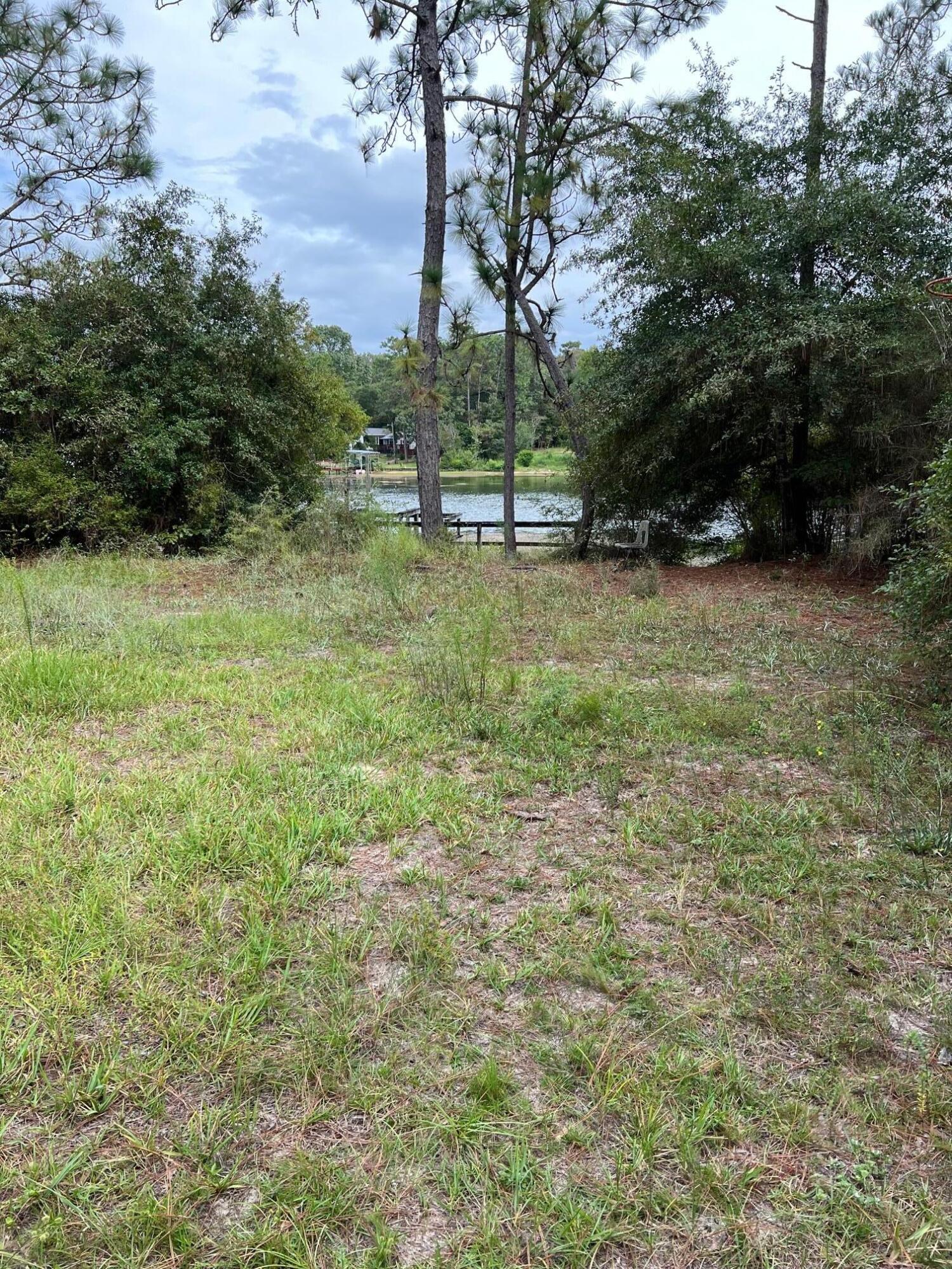 This is a beautiful piece of property on a large lake in a very fast growing area. Power poles and water are already on the property. Build your dream house and live on the water, fishing from your own back yard. Almost all of the property is in the X flood zone. This means that there is no flood insurance requirement. Residential lots on the water are getting very scarce. Make your offer today. Buyer to verify all relevant information. Do not walk on the neighbor's dock on the border of the property.