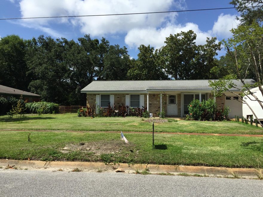 Location Location!! Beautiful Fort Walton Beach home. 329 Parkway Pl SW. New flooring, a lot of remodeling done. Wonderful .26 acre lot with large workshop behind the house. Wood burning fireplace, great appliances. Covered back patio and covered front entrance. 1 Car garage - driveway will accommodate 5 vehicles. Lawn irrigation system with 3 zone control and lawn pump on well. Newer windows, Large double window in front has lockable storm shutters.
Nice pantry in kitchen. Quiet, peaceful neighborhood. Stay close to the water without all the road noise. Less than 5 minutes from public water access. Come see it today!!
