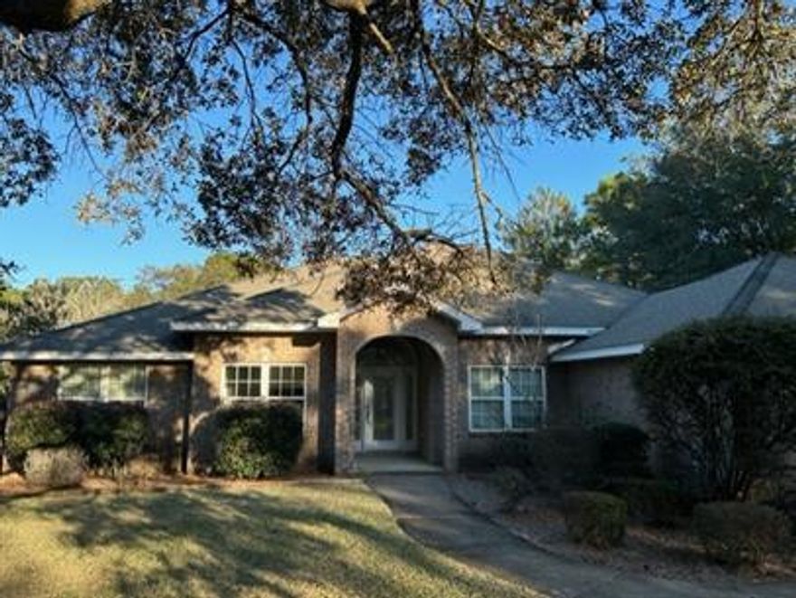 This beautiful 4 bedroom 3 Bath Family Home is located in the Woodmont area of Holley By The Sea and includes lawncare provided by the owner and access to the Holley By the Sea Rec Center which includes a pool, hot tub, Sauna, and Gym. This split bedroom plan is custom built by the owners. Bull nose corners, vinyl windows, natural oak wood floors, tile floors in kitchen and bathrooms, tray ceilings in master, dining room and office. Double convention oven, smooth top stove, corian countertops, kitchen island with sink, wet bar sink in corner of kitchen, walk in pantry with freezer. Master suite features a whirlpool tub, curltured marble double vanities, and shower. Central Vac, 13 Sere AC, lawn pump, sprinkler system plus a built in pest control system. Call 850-936-0700 for more info.