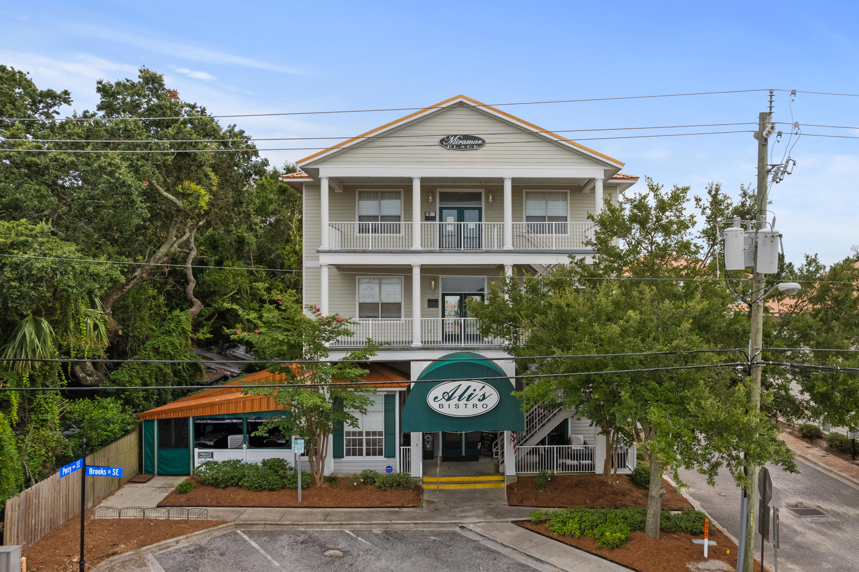 New to market in the bustling downtown of Ft. Walton Beach, is a rare executive office suite in the popular Miramar Place development. Located above the famous Ali's Bistro, this third floor 1,700sf office space has dedicated parking and elevator access. It is within walking distance to the The Landing, Wood Foot Brewing, The Boardroom, and multiple fitness establishments such as Rise N Ride, Hot Yoga OM and Hardbody Fitness.The five offices and conference room all have windows with one of the offices and the conference room having access to private balconies. Staff may also enjoy the break room and en-suite restroom. There are two additional restrooms in the shared entryway. This suite is perfect for a number of professional uses. The office furniture is available to use for a nominal monthly fee. Be a part of Downtown Ft. Walton Beach today!