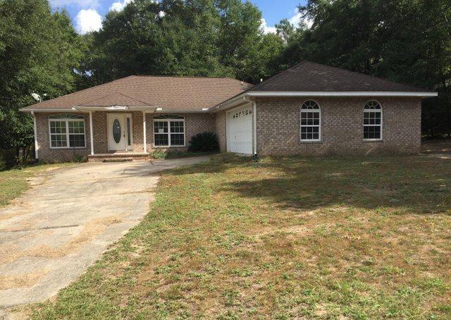REO ~ Awesome Starter Home Opportunity! This 3 Bd / 2 Ba home is move in ready with fresh paint & new carpet. The home offers split bedroom floor plan with vaulted ceilings & fireplace in the living room, formal dining room & spacious kitchen. The master suite features double vanity, garden tub & separate shower. Situated on a large fenced lot. Don't miss this great opportunity.