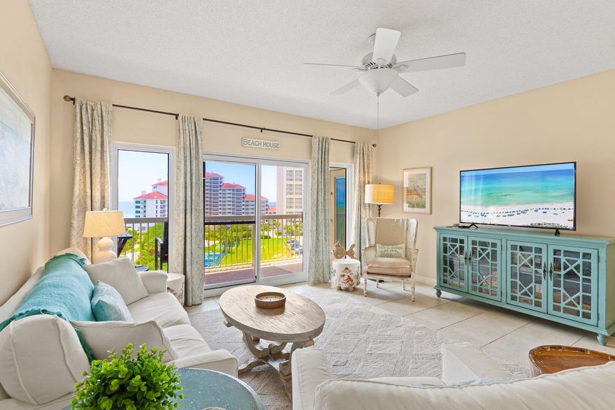 Views! Views! Views!  This delightful 2BR-2BA corner unit in The Summit at Tops'l Resort offers stylish accommodations and beautiful resort and gulf and western facing views. The sugar white beach is 200 yards away and the tropical swimming pool is just downstairs. Simply perfect describes this adorable unit decorated in a trendy coastal style.Upon entry, an open kitchen with new stainless appliances looks right into the bright and inviting living and dining area. There is a guest bedroom with two full size beds and a hallway bathroom. There is a full size stacked washer and dryer in the kitchen as well. The master suite is located towards the rear of the unit and features windows on two sides with absolutely breathtaking views.