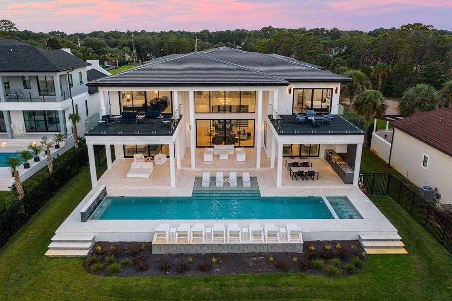 Nestled in the heart of Miramar Beach, 396 Walton Way is a breathtaking new-build estate that epitomizes the art of refined coastal living. Spanning 12,000 square feet, with 7,632 square feet of heated and cooled space, this home boasts a timeless design, state-of-the-art amenities, and unrivaled proximity to the Gulf of Mexico. Every detail has been thoughtfully considered, from the curated selection of high-end finishes to the seamless flow between indoor and outdoor living areas. Featuring $600,000 worth of luxurious designer furniture from premier European and American brands, this spectacular residence offers an unparalleled lifestyle of comfort, elegance, and sophistication. As you approach the property, you're greeted by lush landscaping and a meticulously designed exterior that blends with the natural beauty of the surrounding area. The spacious open-concept floor plan showcases expansive living spaces, highlighted by soaring ceilings, custom millwork, and an abundance of natural light. Every element has been meticulously crafted, from the handpicked selection of exquisite finishes to the harmonious connection between indoor and outdoor living spaces. Featuring $600,000 worth of luxurious designer furniture from the most prestigious European and American brands.

The gourmet kitchen is a chef's dream, featuring top-of-the-line appliances, sleek cabinetry, and a large center islandideal for both casual dining and entertaining. A standout feature of this kitchen is the private door leading to the impressive walk-in pantry. This hidden gem is outfitted with a secondary fridge, a deep sink for prep work, and ample storage, ensuring the ultimate in convenience for both everyday living and entertaining on a grand scale.
The adjoining living and dining areas are perfect for hosting guests, while the expansive sliding glass doors lead to a stunning outdoor oasis.

Outside, the luxurious pool and spa provide the ultimate in relaxation, with serene views of the beautifully landscaped grounds. Whether you're lounging on the sun deck, enjoying al fresco dining on the patio, or unwinding in the hot tub, the outdoor spaces are designed to complement the relaxed, yet refined coastal lifestyle.

The master suite is a sanctuary, complete with a private balcony, spa-inspired bathroom, and a spacious walk-in closet. Additional bedrooms and guest suites offer privacy and comfort, ensuring that friends and family feel right at home. With smart home technology, a state-of-the-art home theater, and ample storage space, no detail has been overlooked.

Located just moments from the pristine beaches of Miramar Beach and world-class dining, shopping, and entertainment, 396 Walton Way offers the perfect blend of exclusivity and convenience. This is not just a homeit's a statement. A rare opportunity to own a piece of paradise in one of the most sought-after locations on the Emerald Coast!
