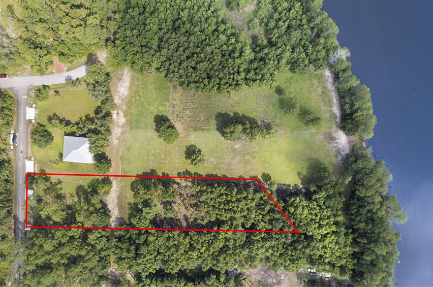 Vacant Lot. Over half acre buildable, the options are endless, build a home, add a pool, a place for all the toys, gardening, and complete privacy in the heart of Point Washington with no HOA. Take advantage of fishing and watching the barges go by on the Intracoastal that leads to the Choctawhatchee Bay and the Gulf of Mexico.